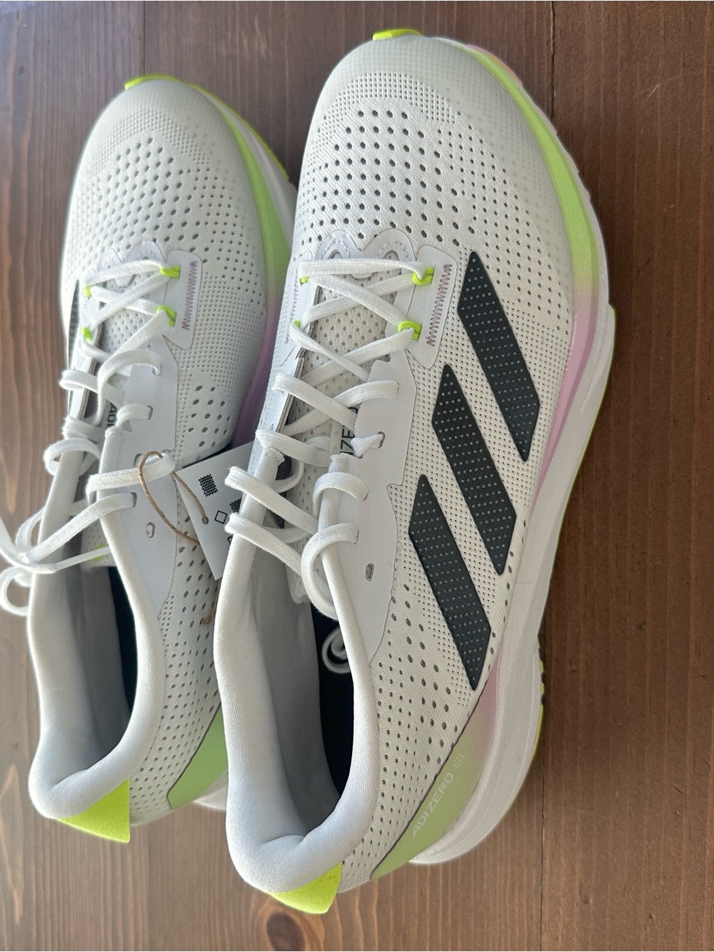 adidas White Running Shoes with Black Stripes and Neon Yellow Accents unisex